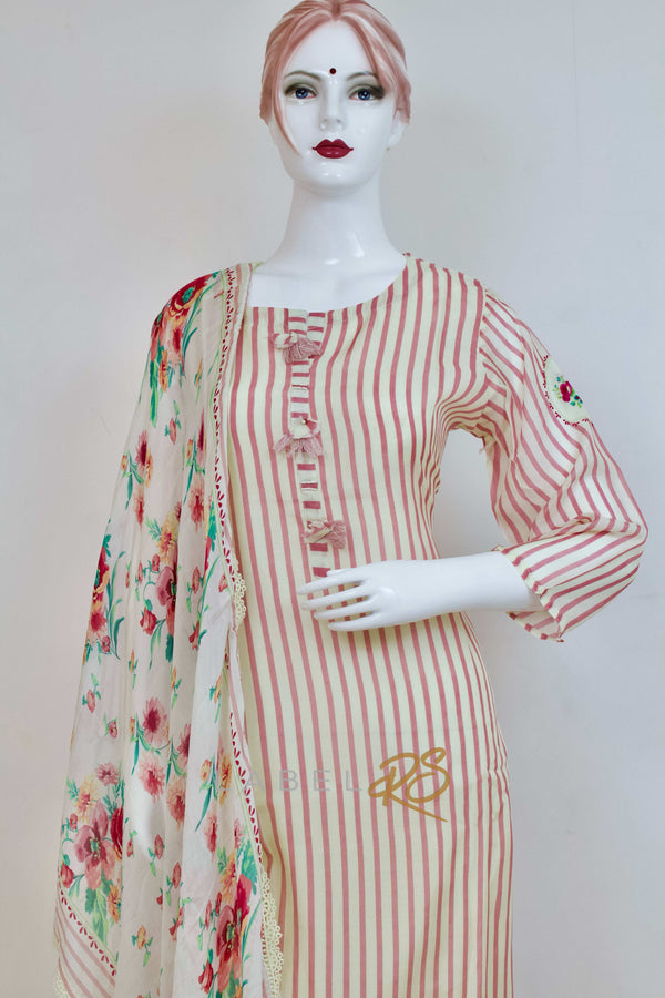 Striped Suit adorned with delicate tassels.